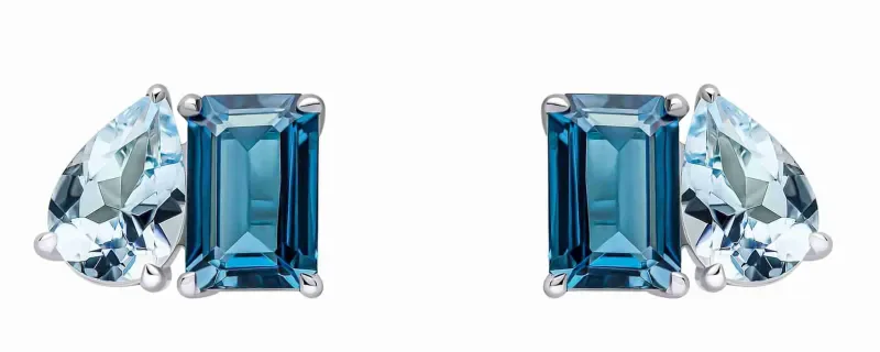 Boucles d oreilles topaze bleue  ciel d azur  en or blanc 375 carats