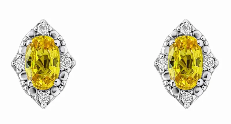 Boucles d'oreilles diamants et saphir jaune en or jaune 375 carats.