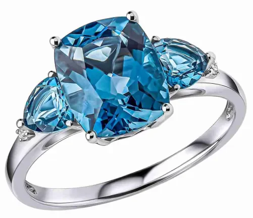 Bague pour femme en or blanc 375 massif sertie d'une topaze bleue marine naturelle facettée d'un bleu profond.