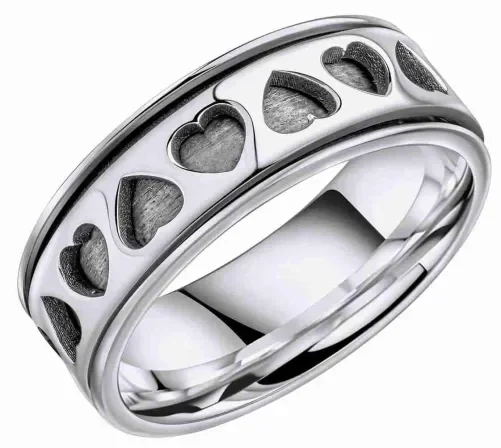 Bague pour femme en argent massif 925 avec anneau tournant aux motifs de cœurs découpés et ajourés.