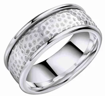 Bague unisexe en argent massif 925 avec anneau tournant aux finitions brossée et martelée anti-stress.